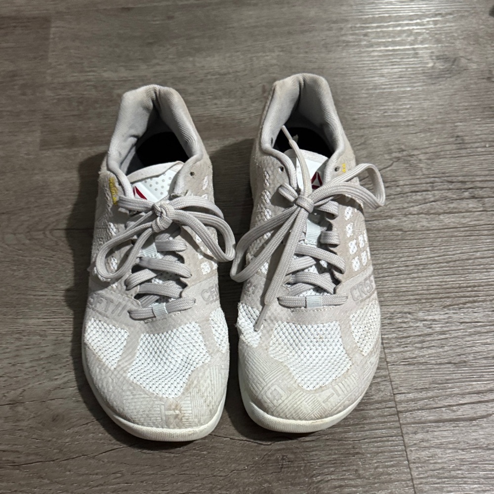 White and gray Reebok CrossFit shoes